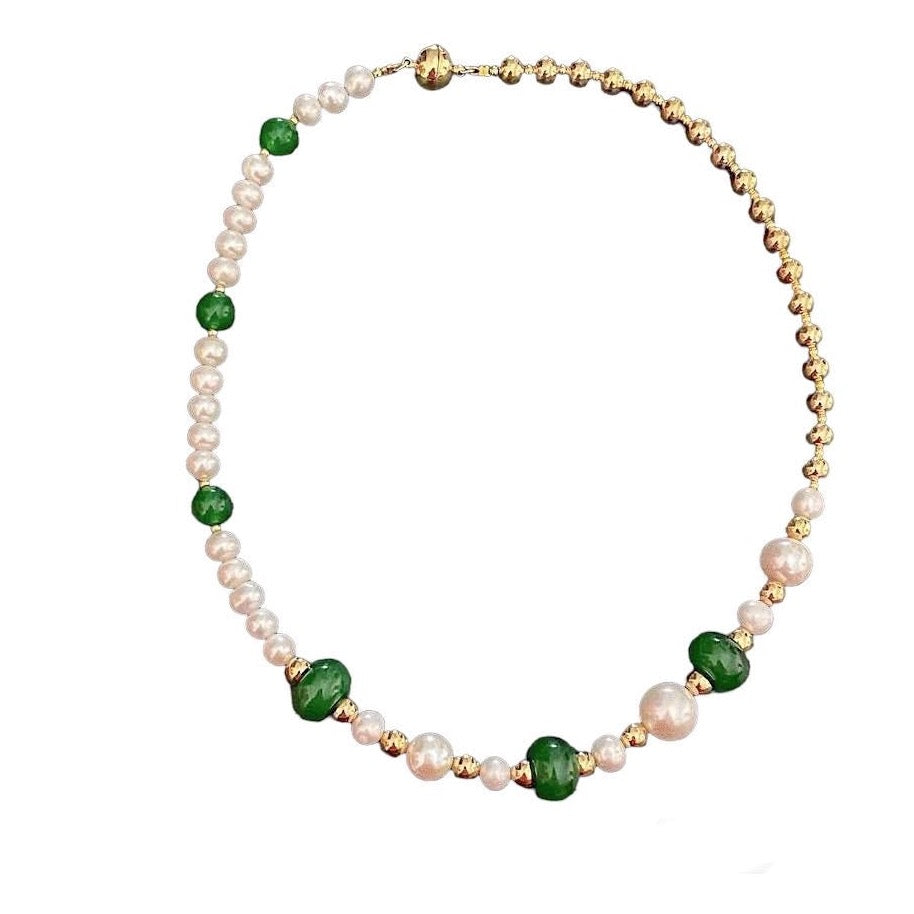 JADE WITH PEARL AND GOLD BEAD