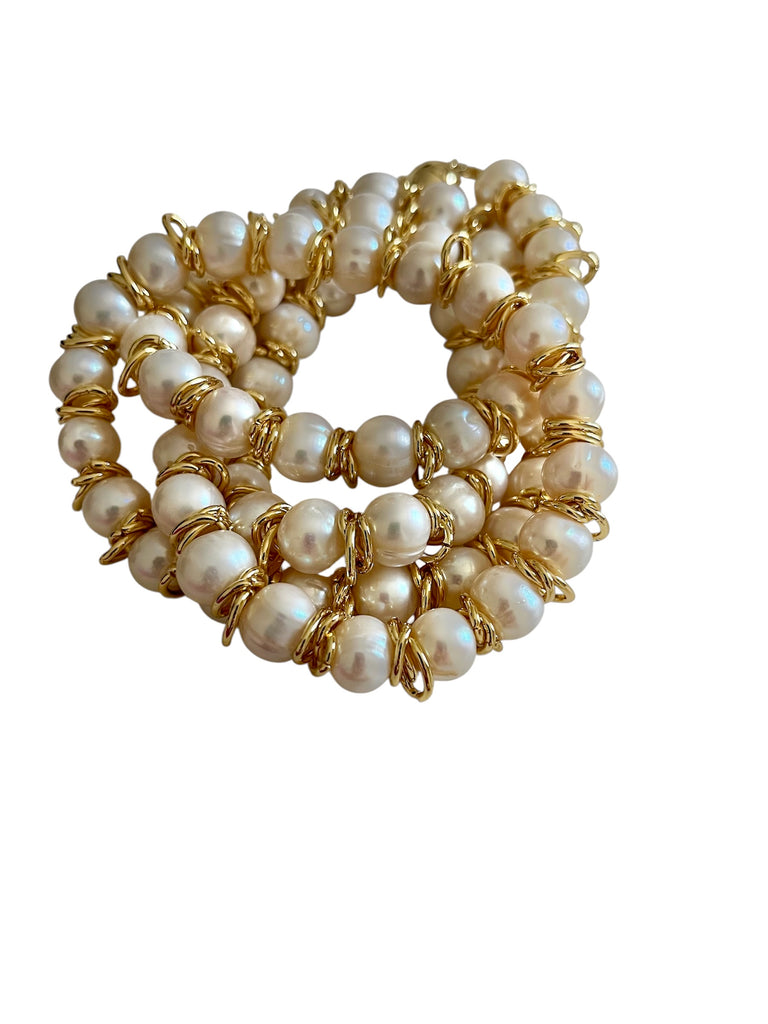 PEARL IN GOLD RING